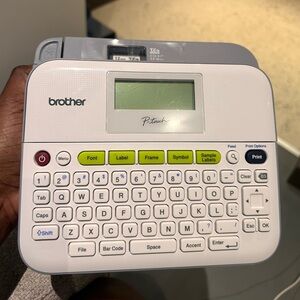 Brother label maker in white, gray and green